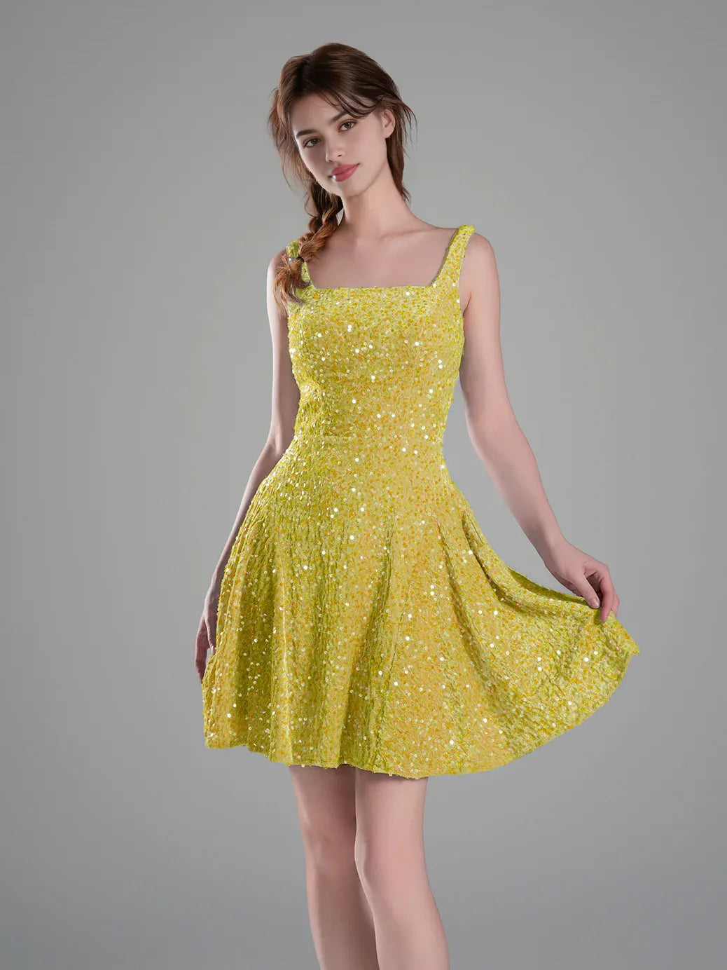 Yellow sequined A-line mini dress with square neckline and spaghetti straps