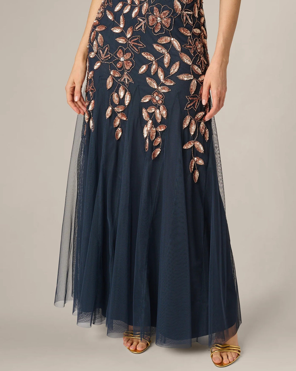 Navy A-line maxi skirt with rose-gold floral embroidery and layered tulle hem