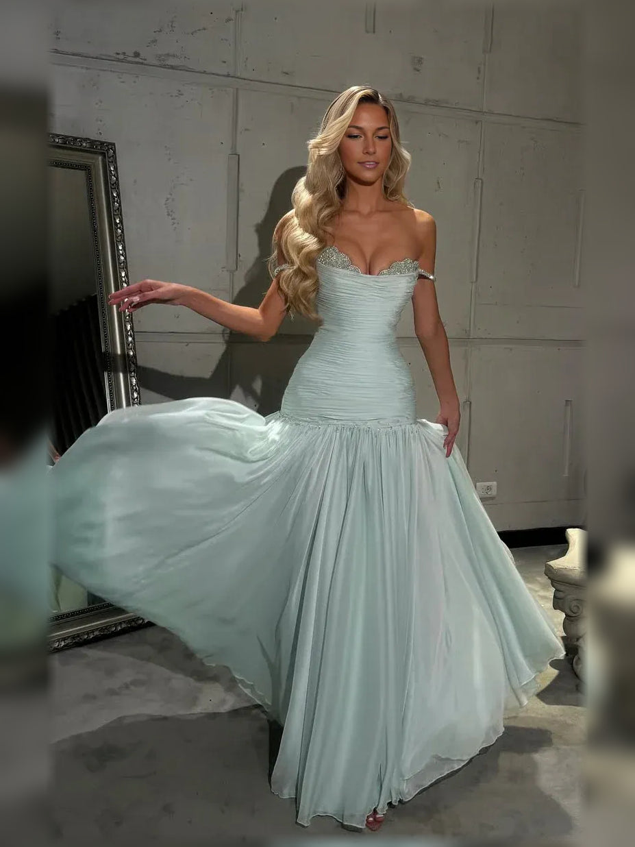 Baby blue off-shoulder formal dress with ruched bodice and flowing tiered skirt