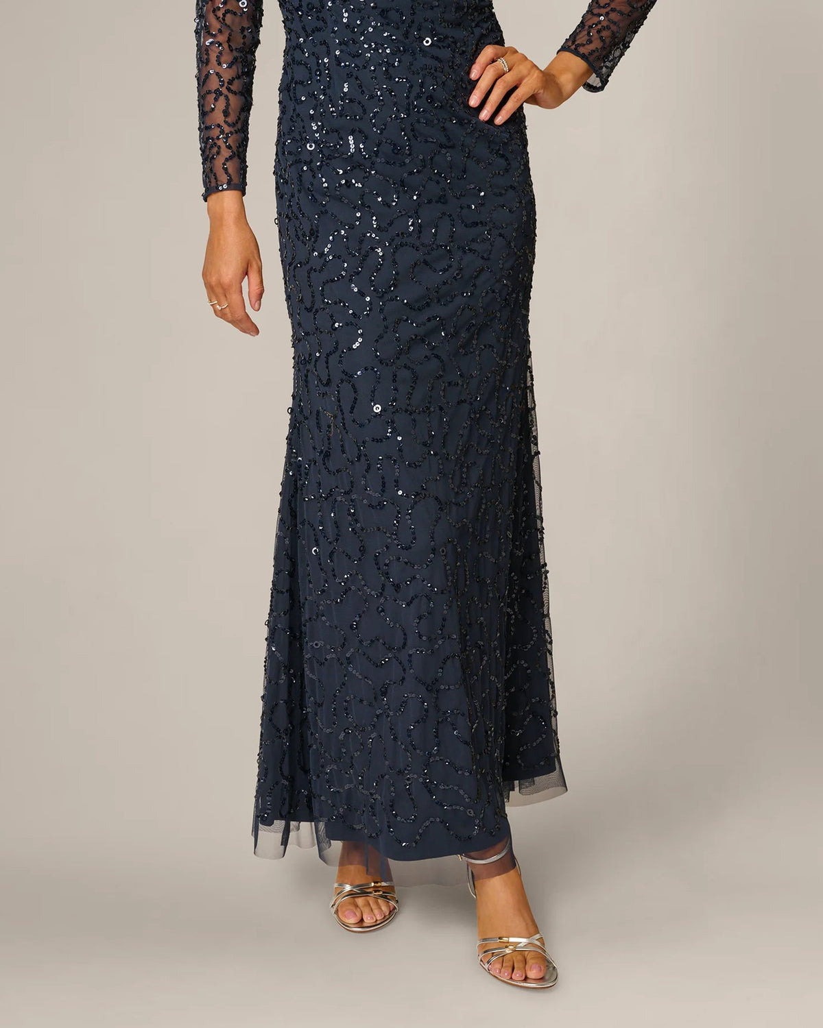Navy sequin maxi dress with off-shoulder neckline and sheer floral lace sleeves