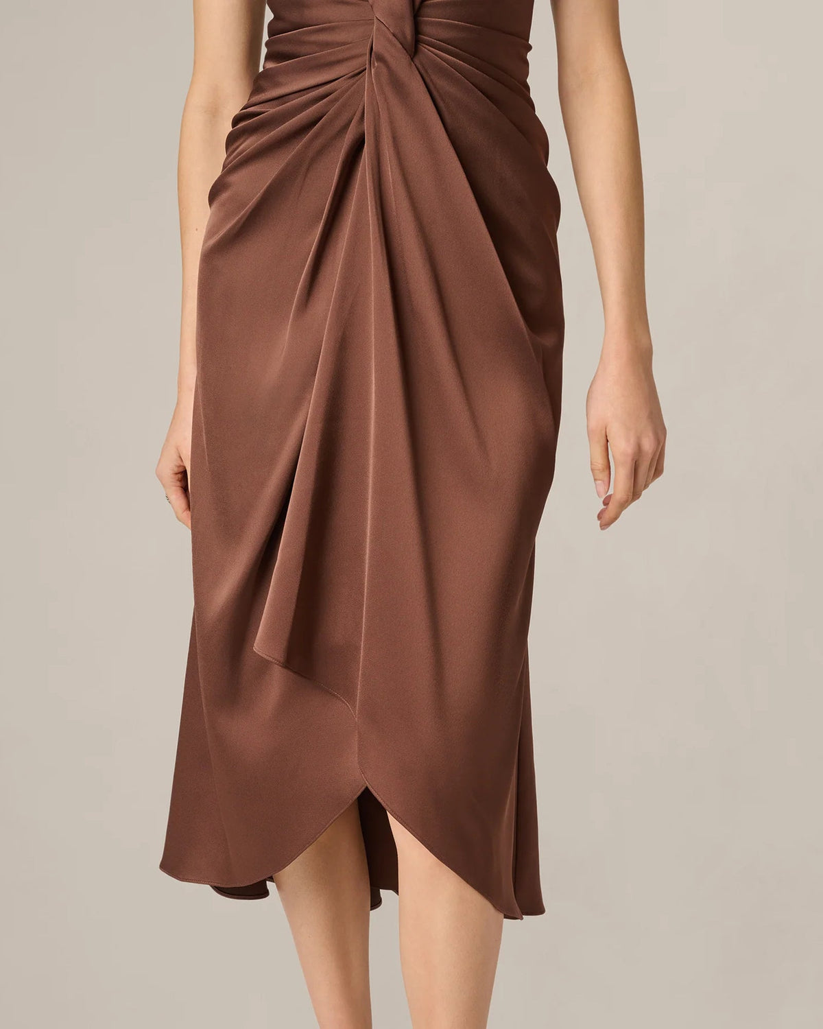 Espresso-brown midi dress with asymmetric wrap overlay and draped slit hem
