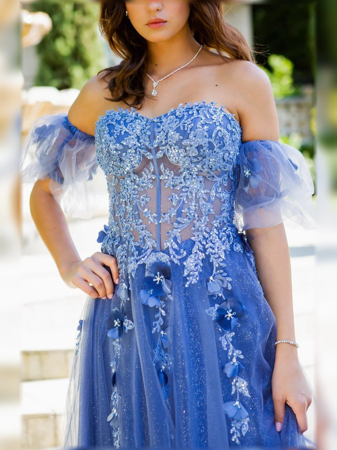 Blue floral off-the-shoulder formal dress with lace-like applique and tulle sleeves