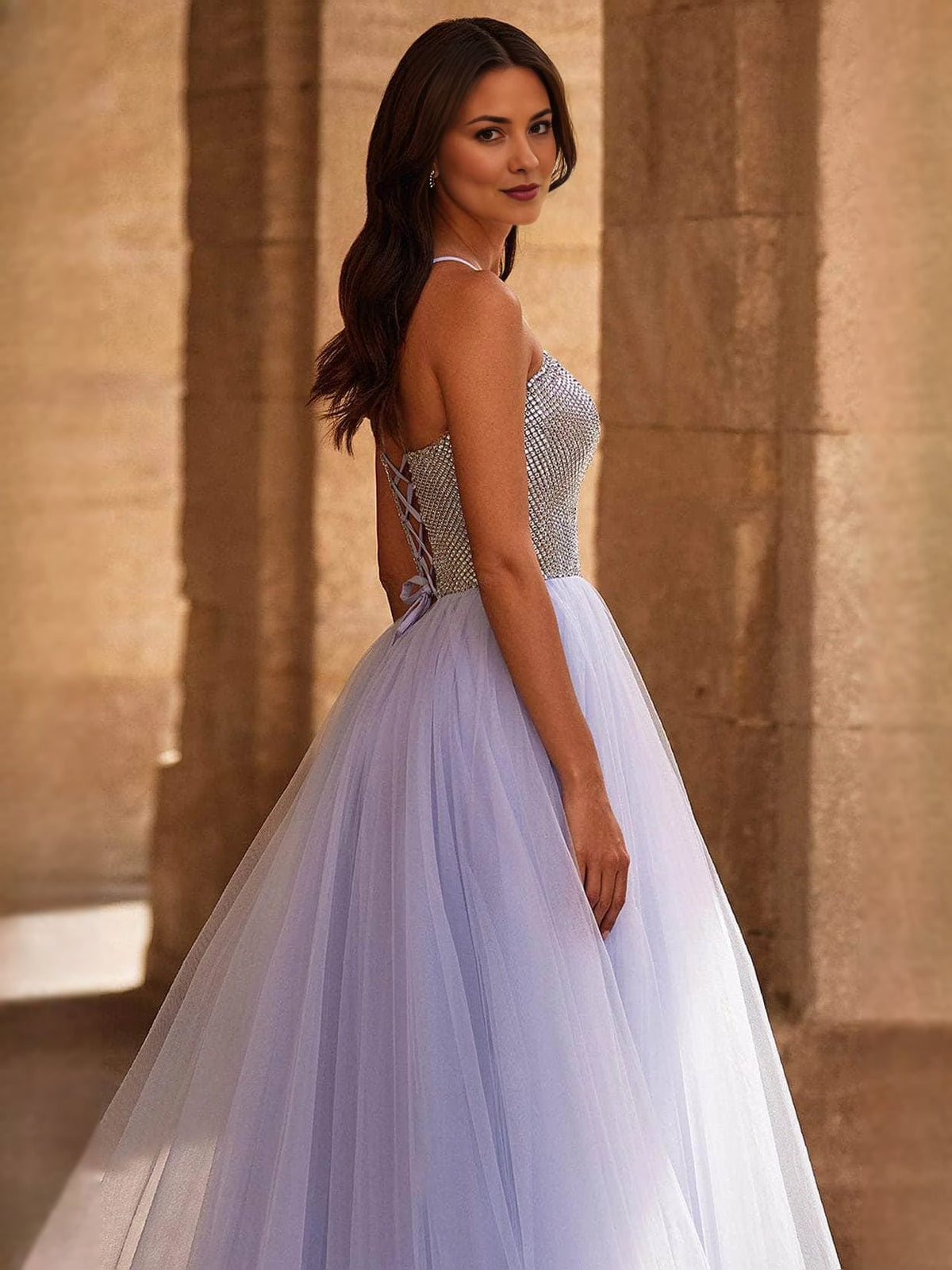 Lavender A-line tulle prom dress with rhinestone beaded back detail and floor-length skirt
