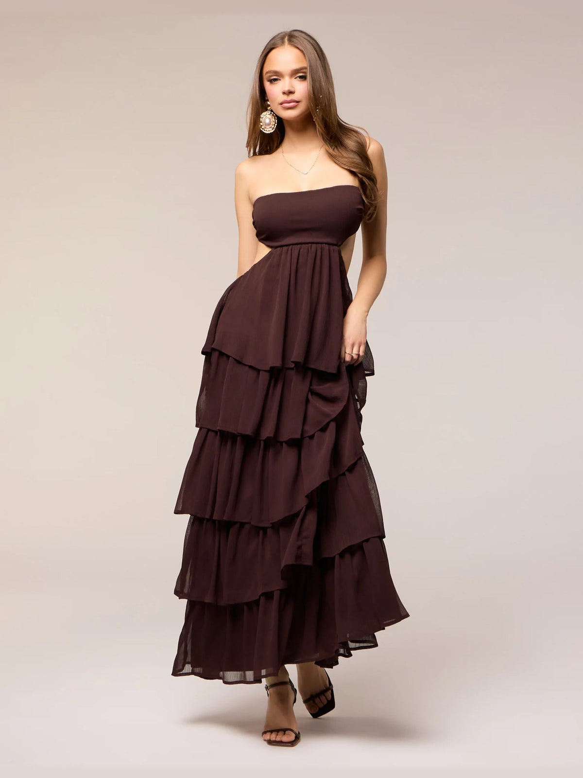 Brown formal dress with tiered detailing