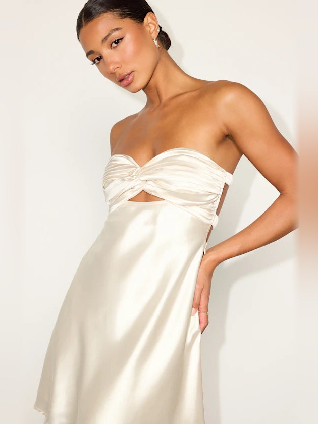 Cream strapless satin mini dress with pleated center bow and sweetheart neckline