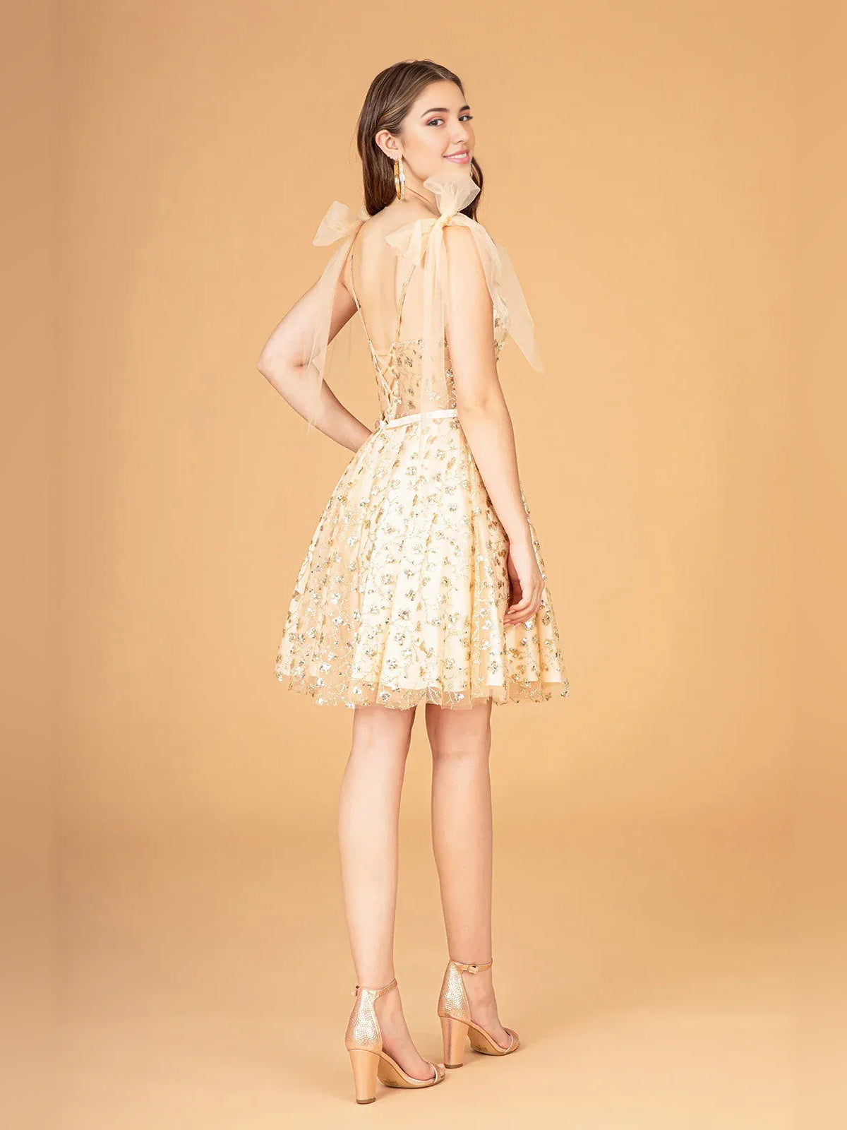 Champagne floral corset mini tulle dress with V-neck, bow straps, and A-line skirt