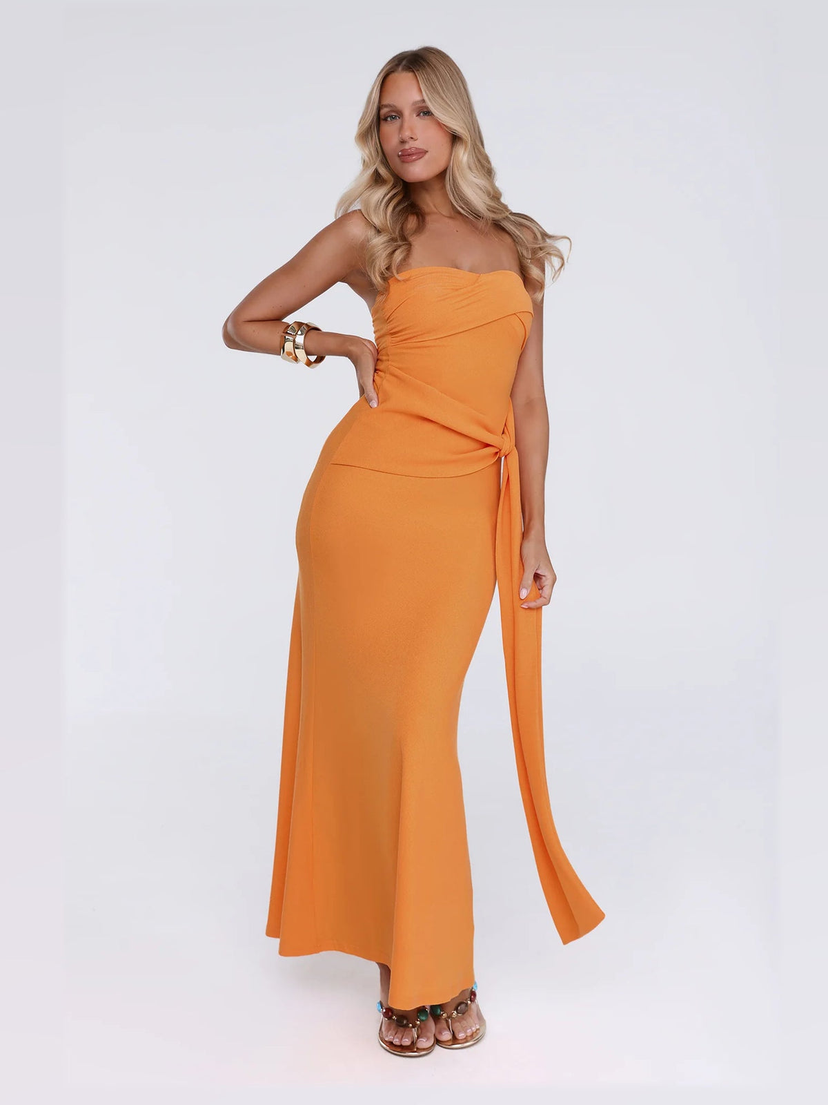 Orange maxi formal dress, alternate full-length view showing the skirt