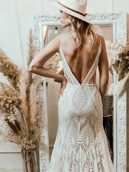 Ivory lace wedding dress with thin straps, deep V-back, fitted mermaid skirt