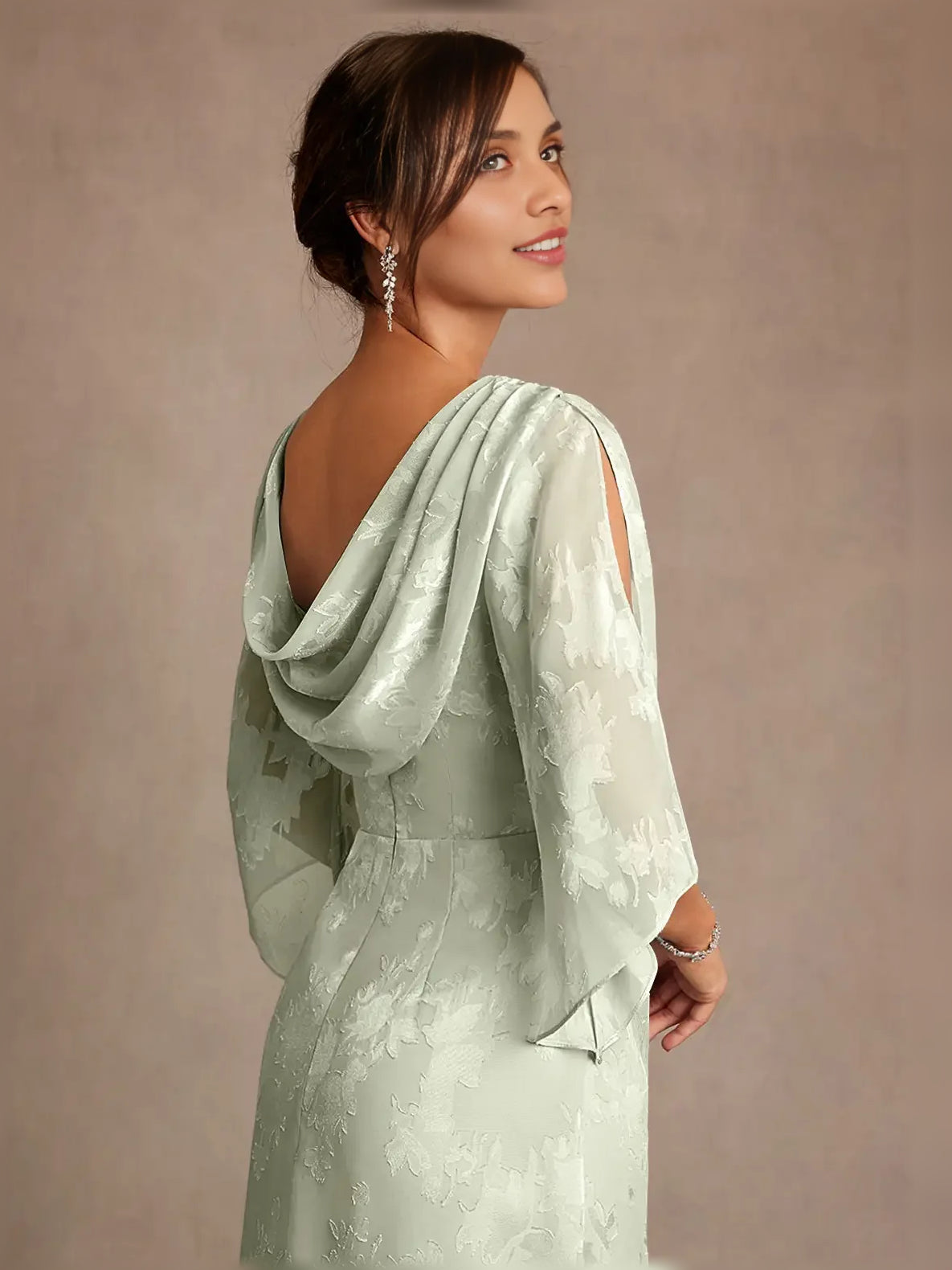 Mint green dress with draped cowl back and flowing cape sleeves