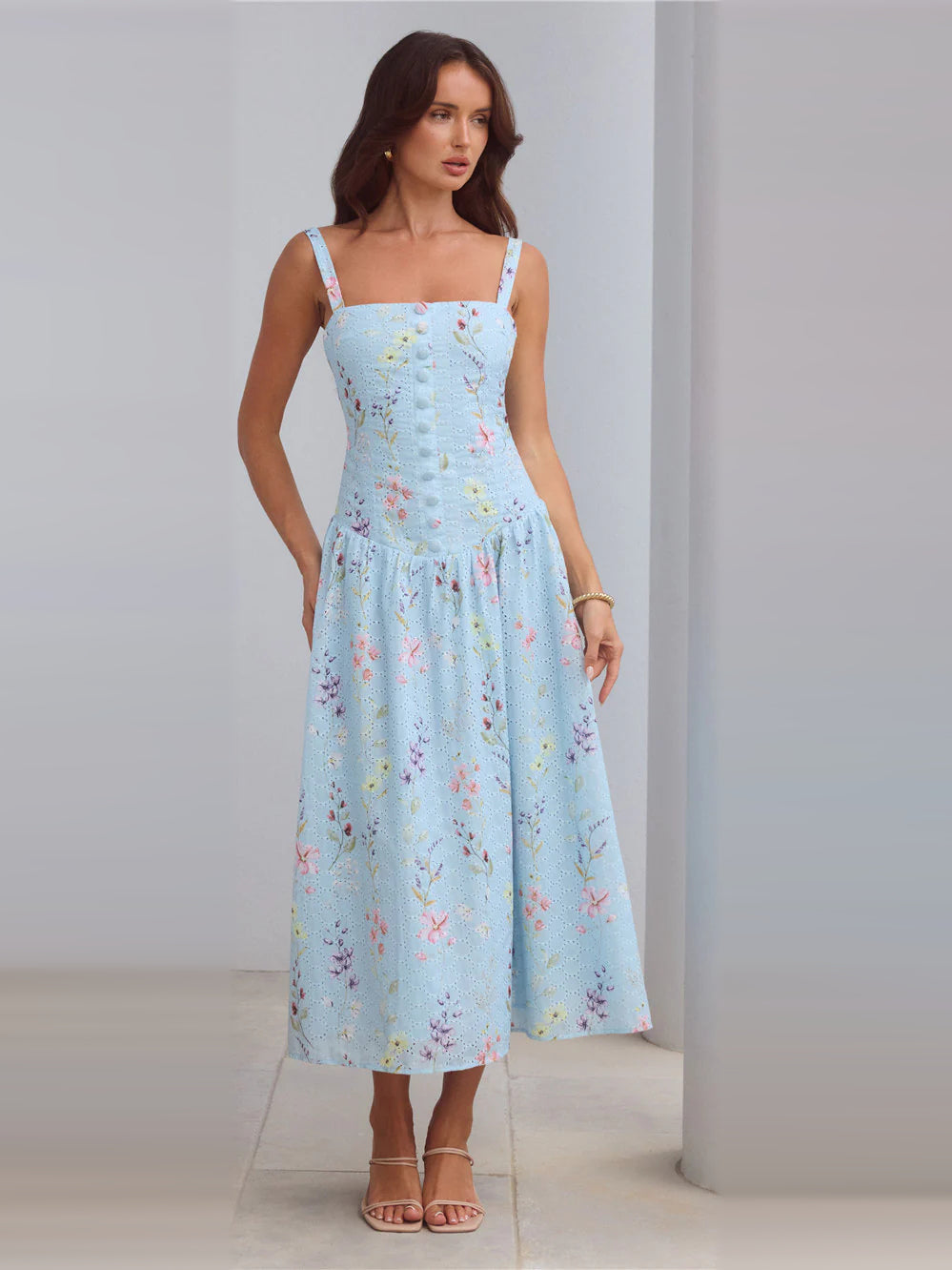 Blue a-line maxi formal dress with floral print, alternate full-length view showing the waist