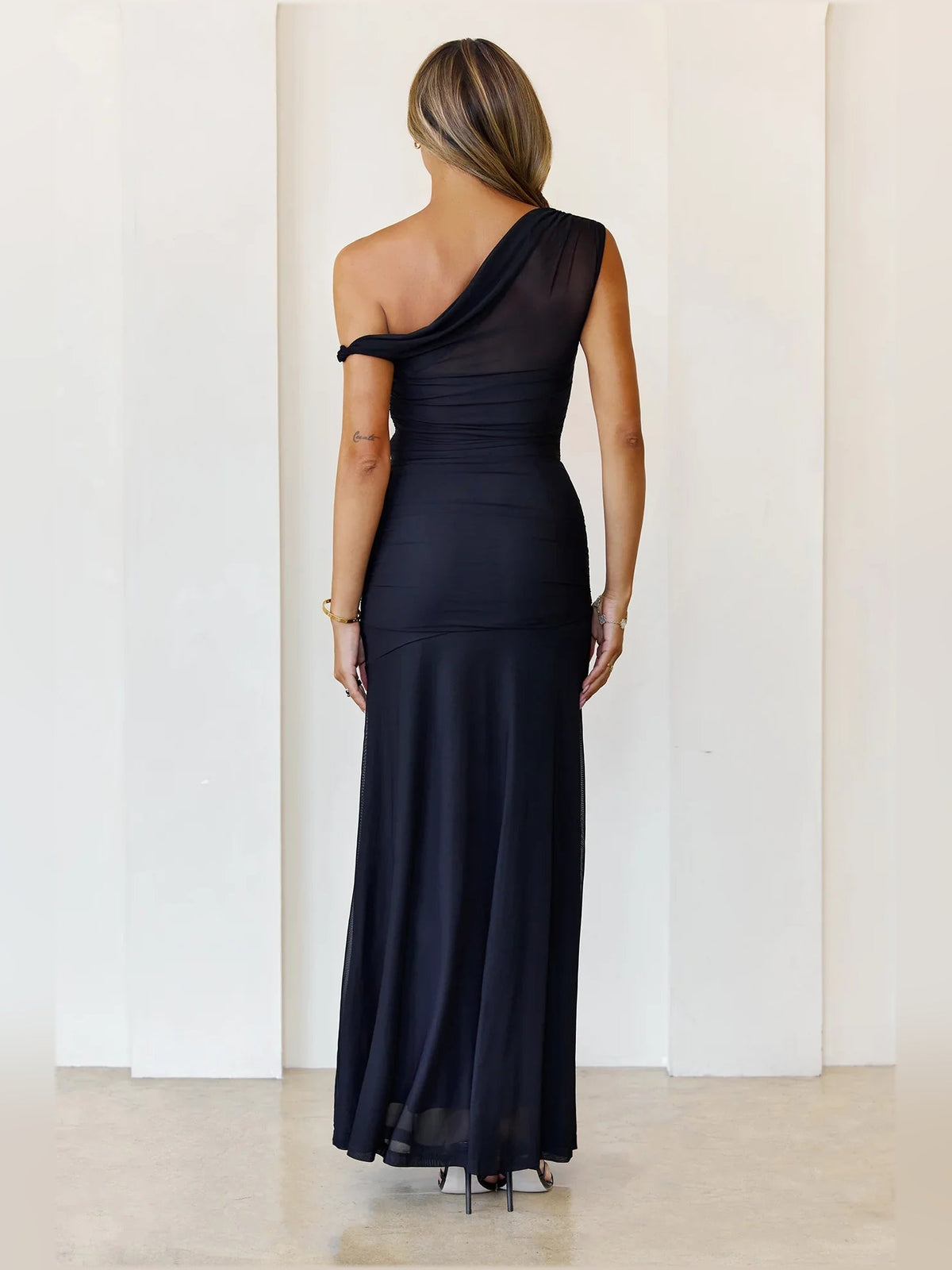 Black ruched draped maxi sheath dress, open back, one-shoulder asym neckline