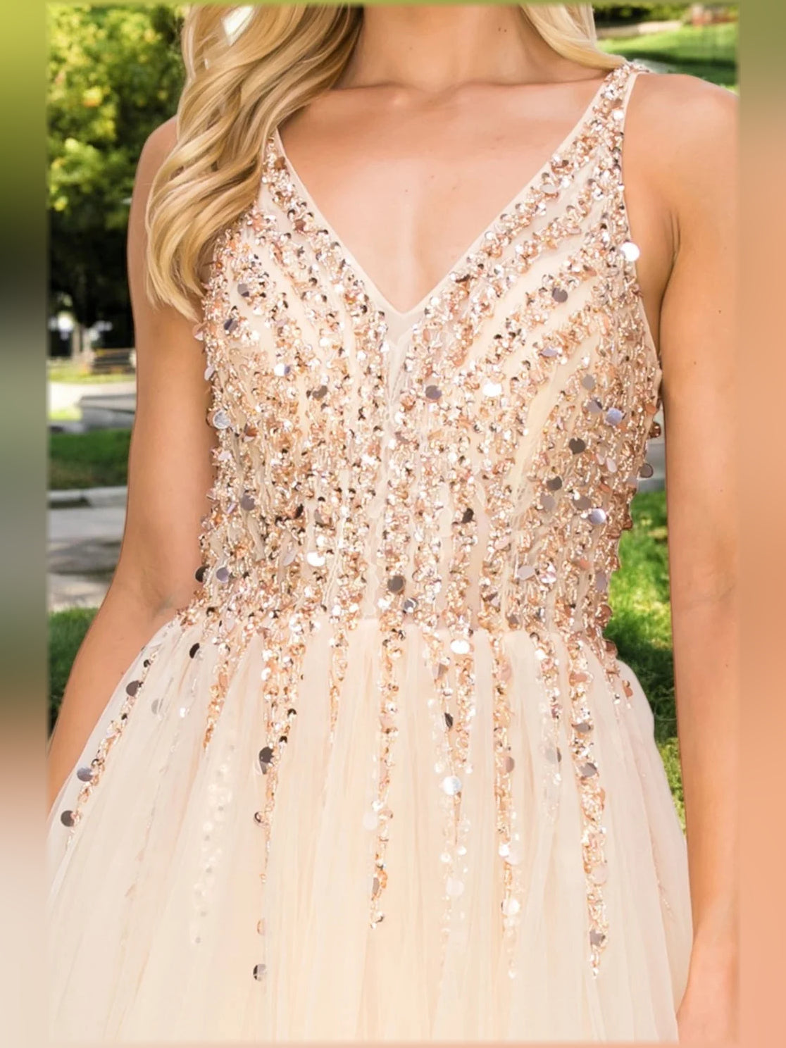 Champagne beaded V-neck bodice with sleeveless straps and glitter detailing