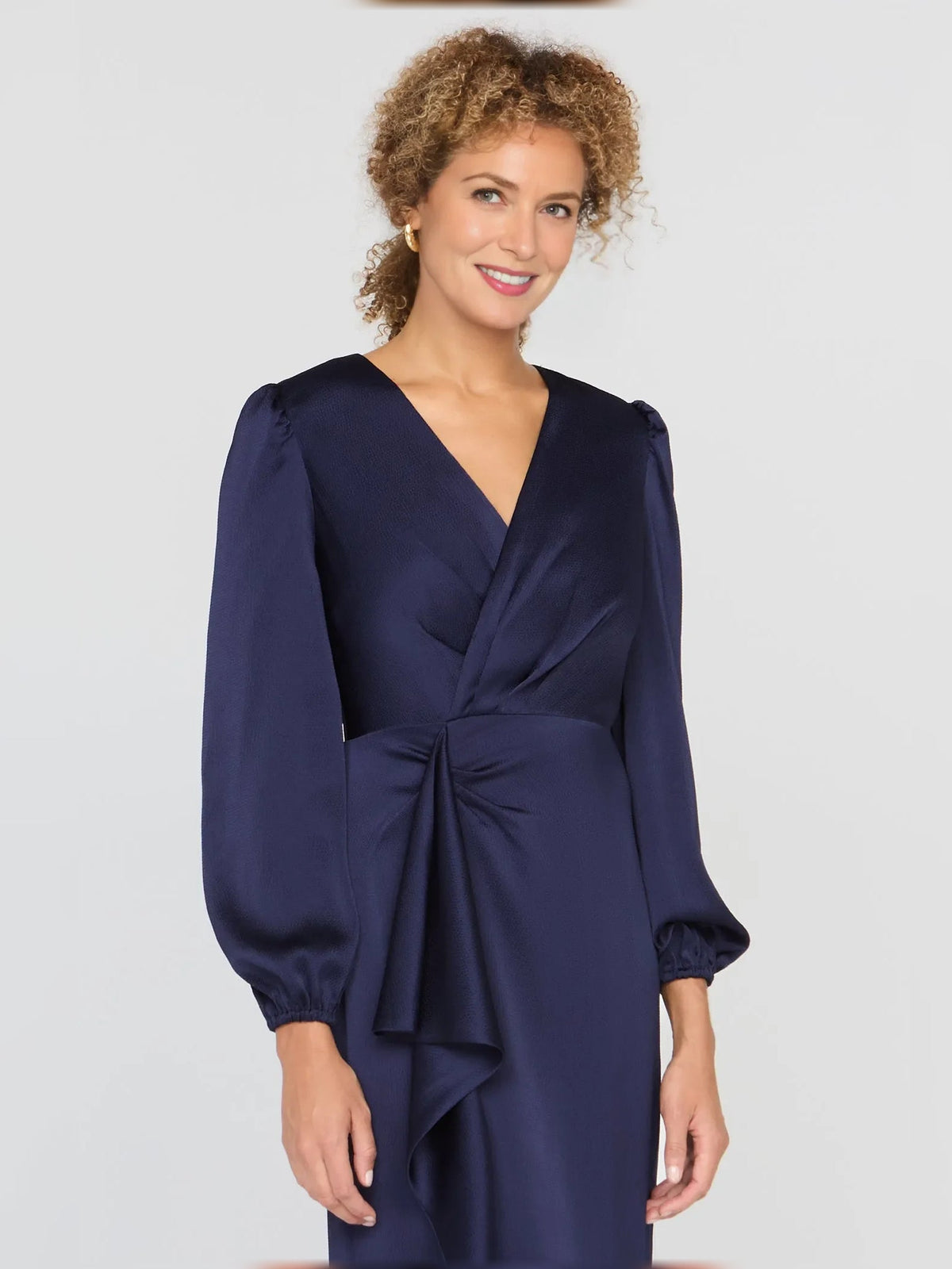 Dark navy satin V-neck dress with draped waist bow detail and long puff sleeves