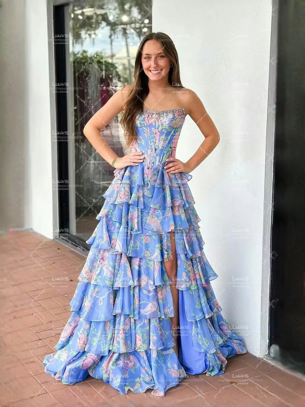 Blue floral corset-style sweetheart A-line prom dress with tiered ruffles and long skirt