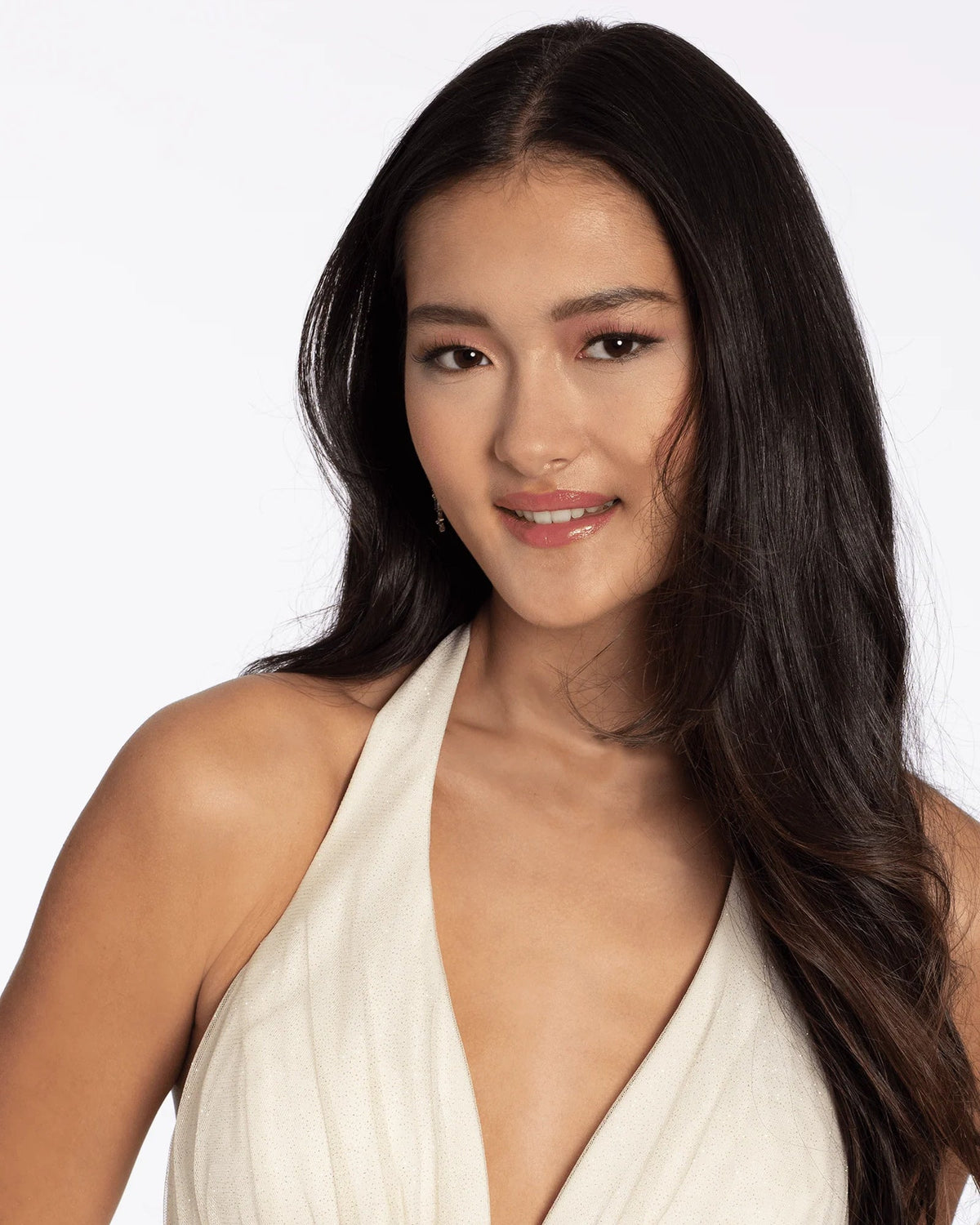Ivory halter dress with deep V neckline and embroidered bust detail