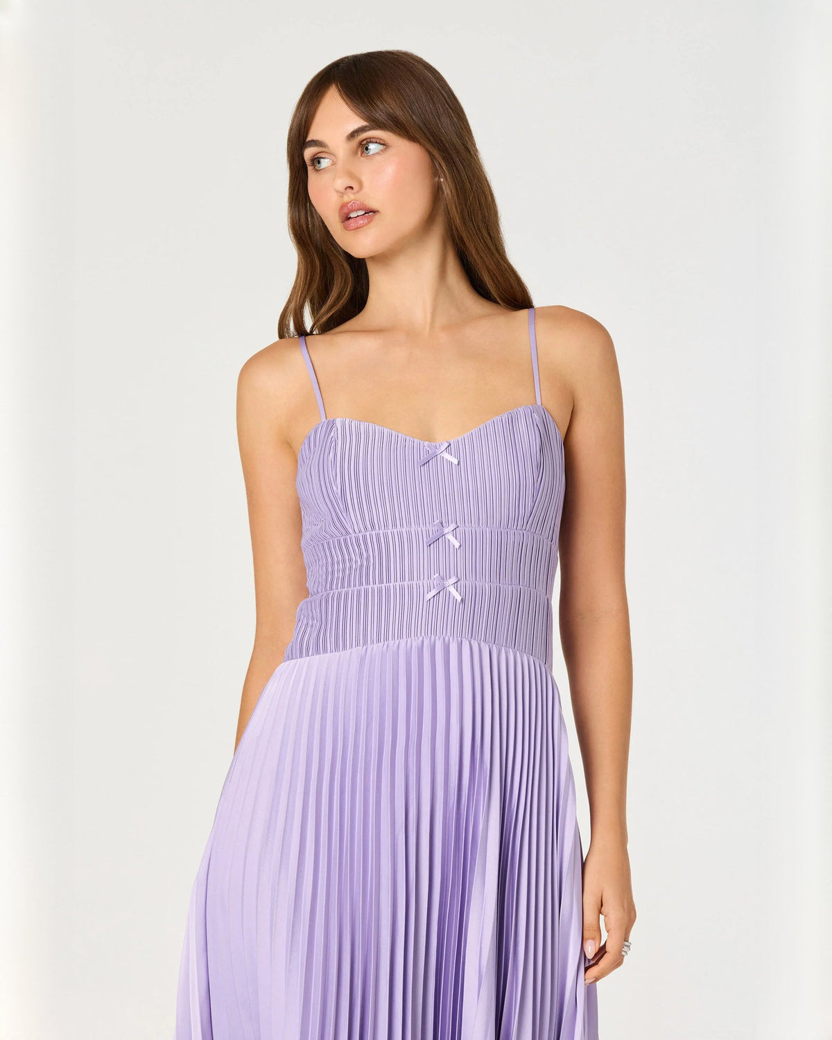 Lilac sleeveless chiffon midi dress close-up, sweetheart bodice and bow applique