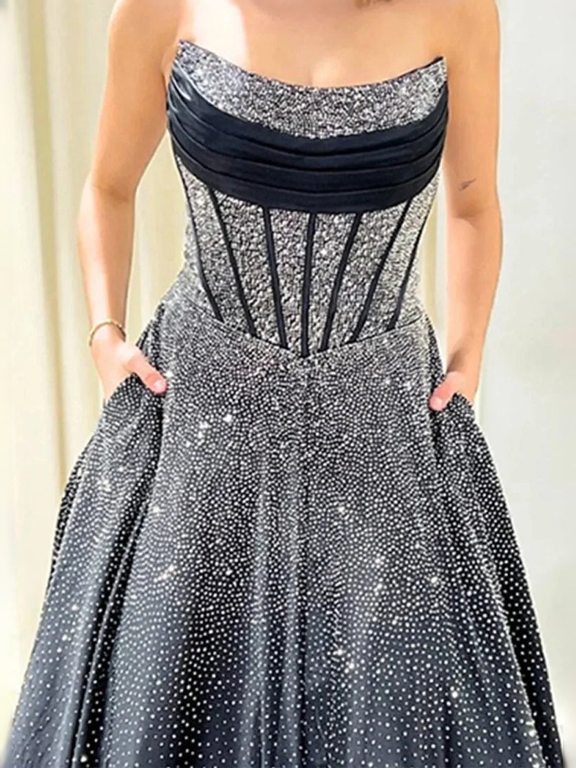 Black and silver corset bodice with sparkling mesh overlay and textured skirt top