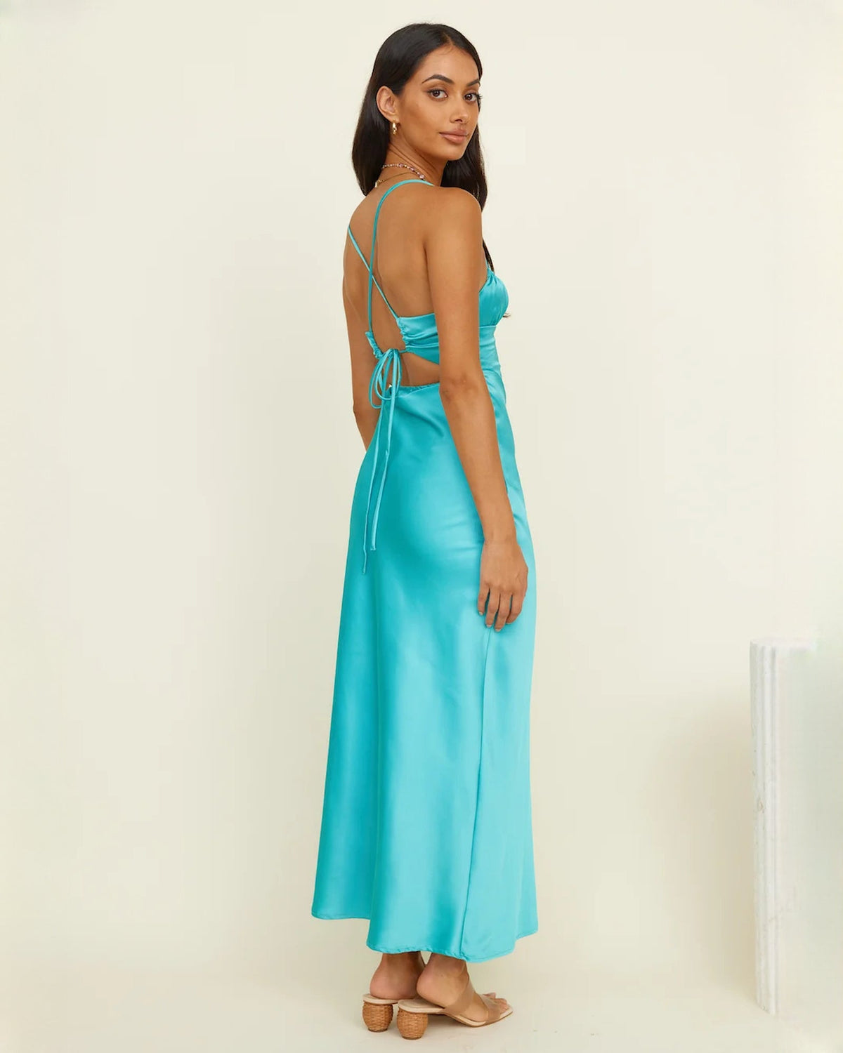 Aqua satin sleeveless maxi dress with crisscross back straps and open back