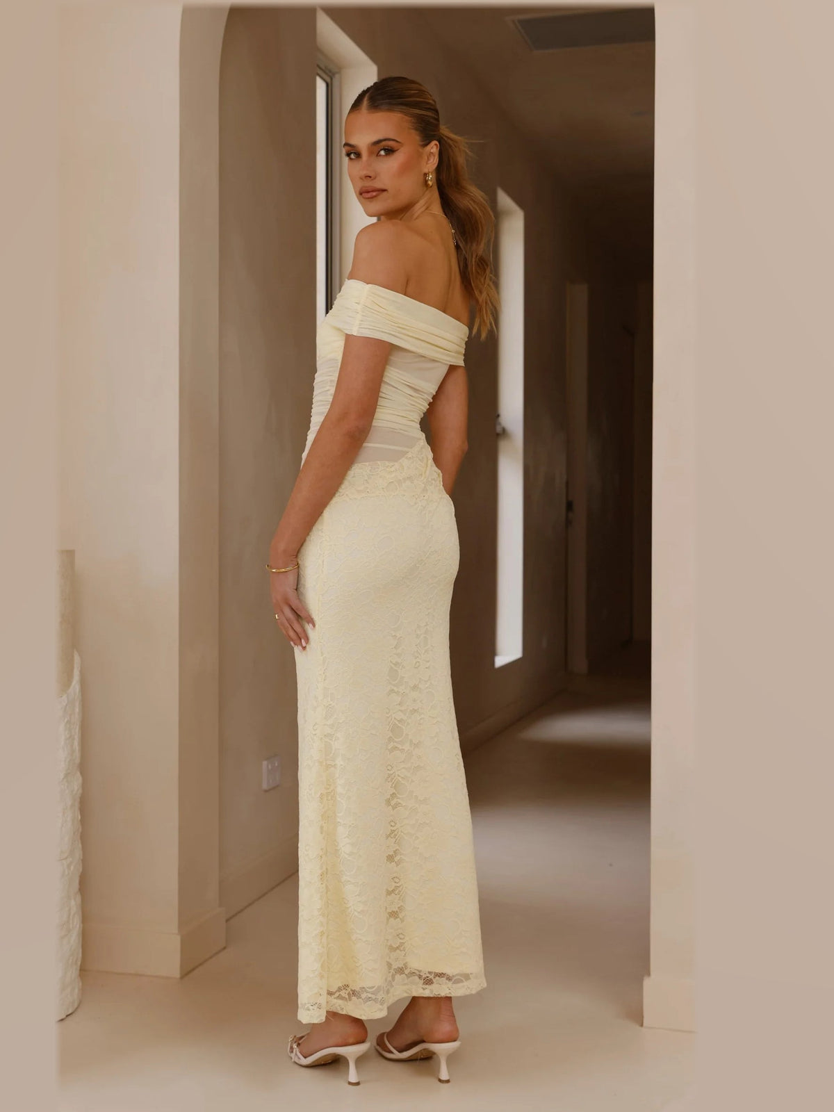 Yellow maxi formal dress, alternate full-length view showing the skirt