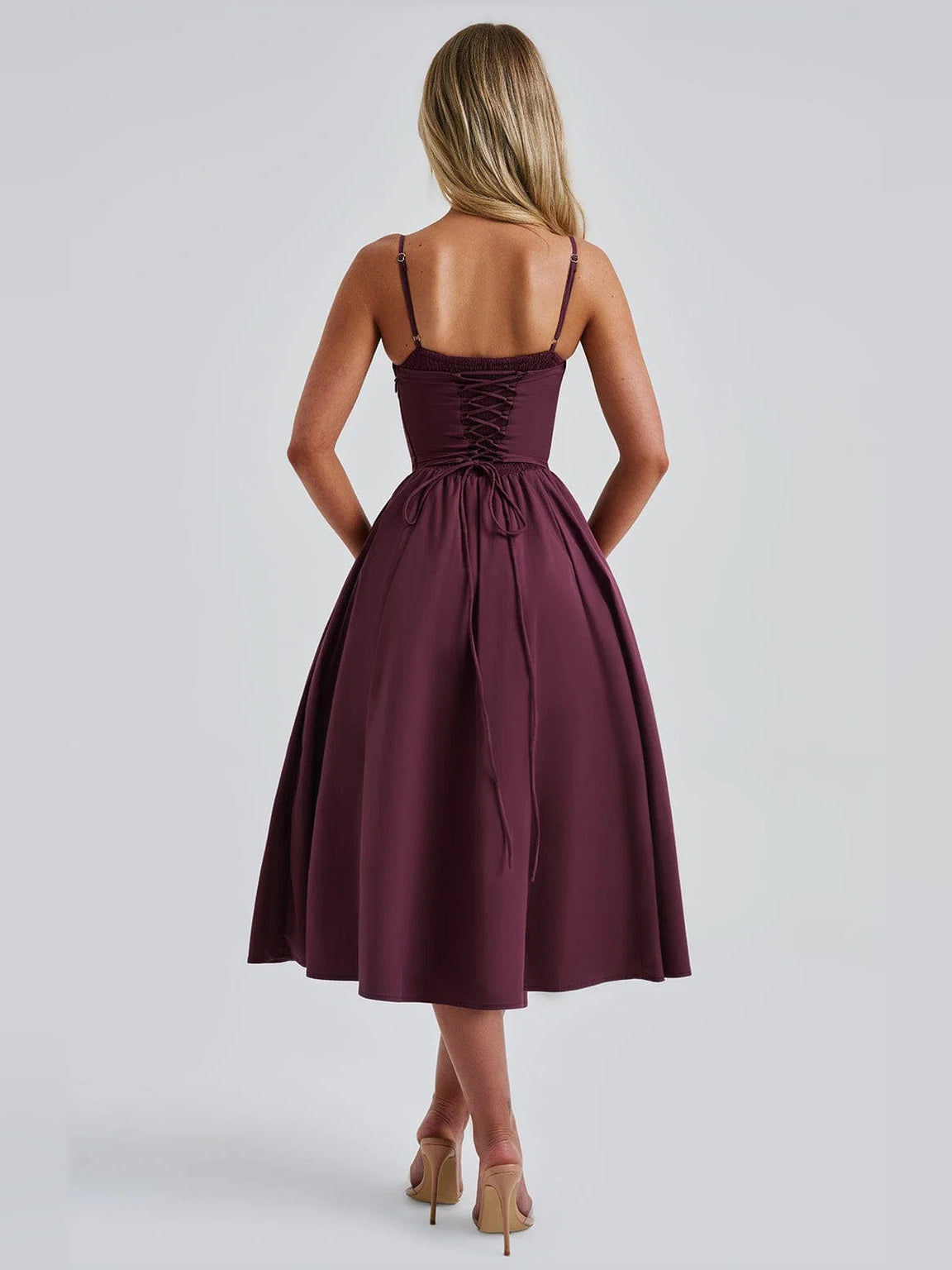 Cherry midi formal dress back view with spaghetti straps, cinched waist, gathered pleated skirt