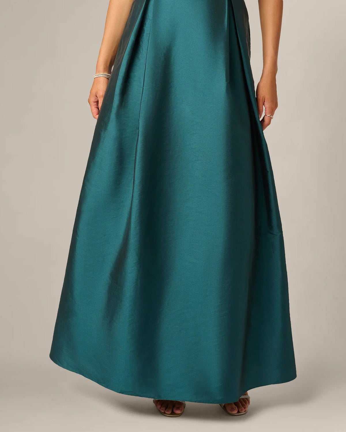 Teal green A-line maxi satin skirt with waist seam and full flare