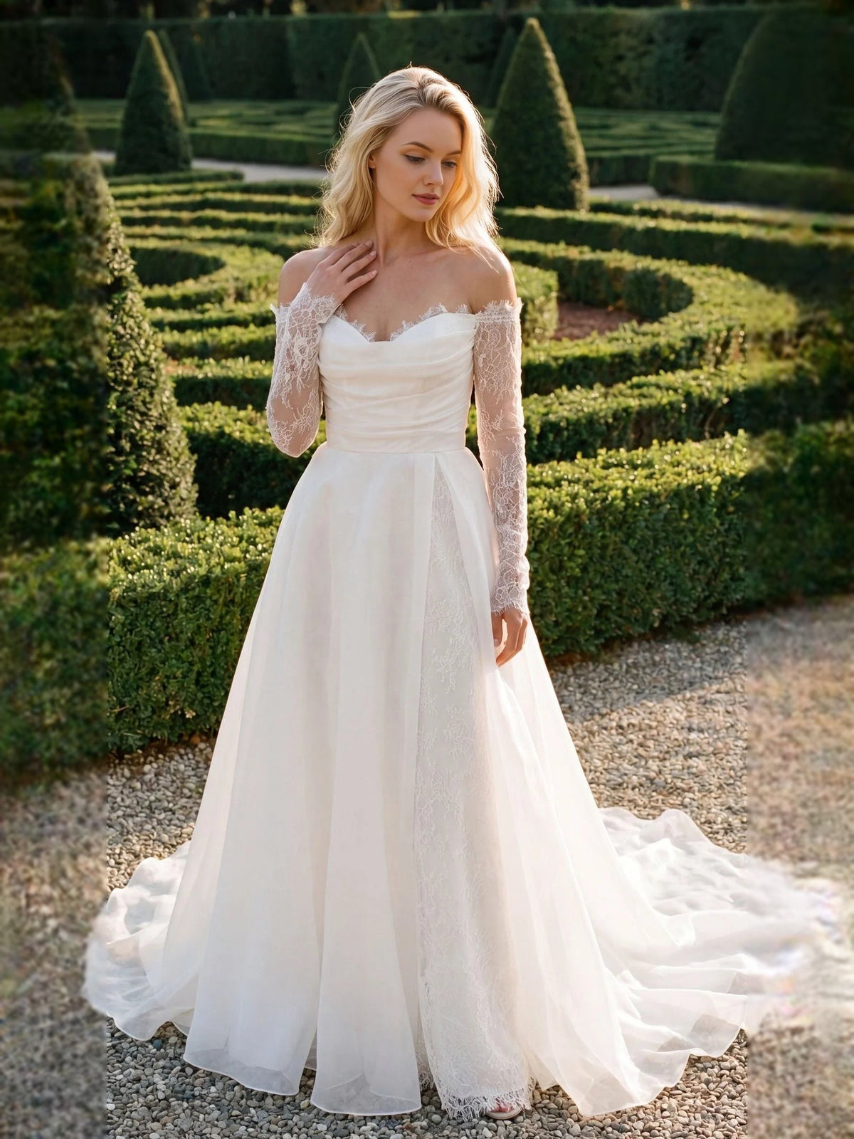 Ivory A-line organza-style wedding dress with lace sleeves and floor-length skirt