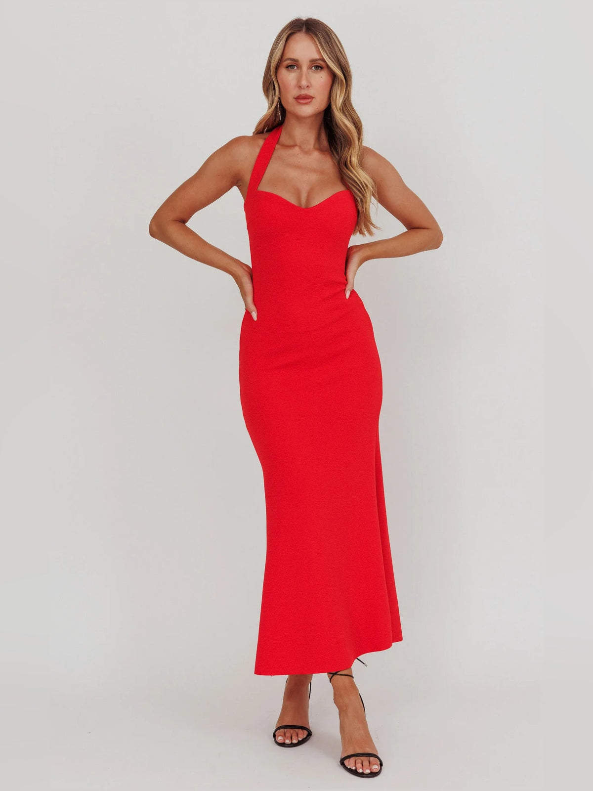 Red sheath maxi formal dress with halter neckline, alternate full-length view showing the waist