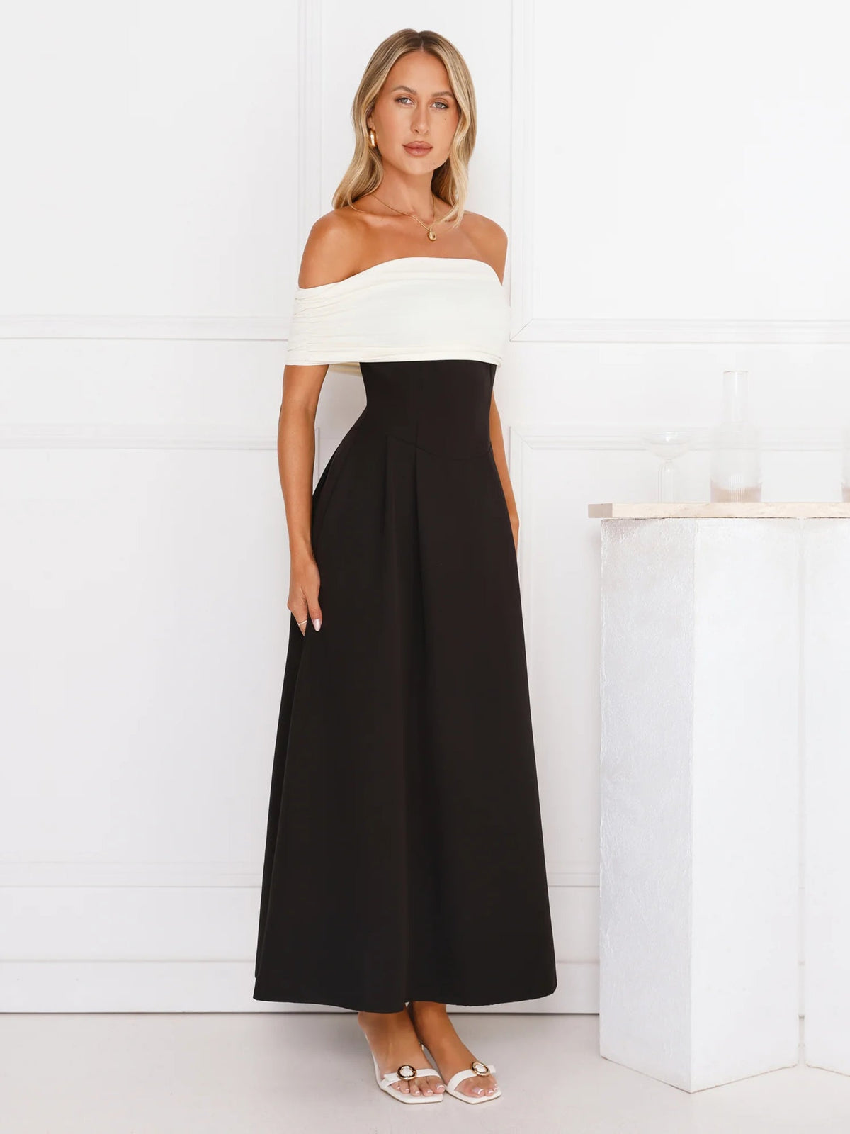 Black a-line maxi formal dress with off-the-shoulder neckline, alternate view showing the waist