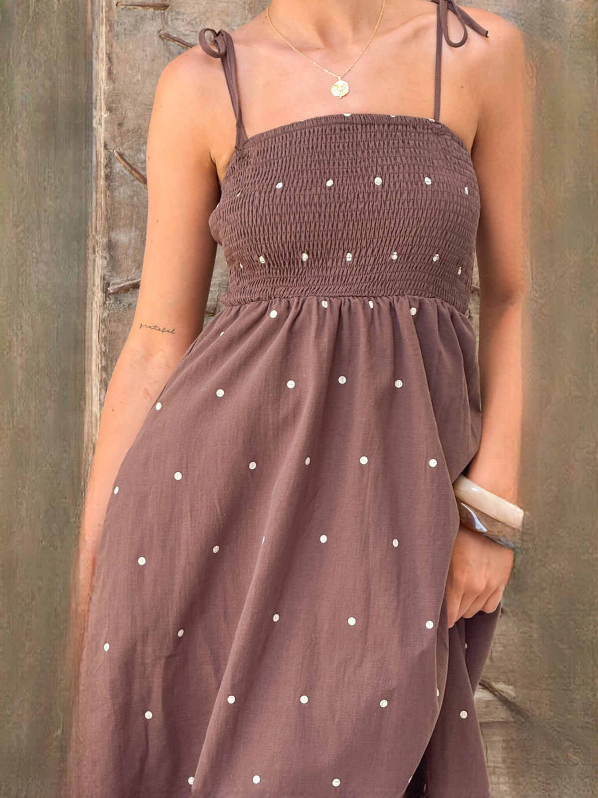 Chocolate a-line maxi formal dress with printed pattern, alternate full-length view showing the waist