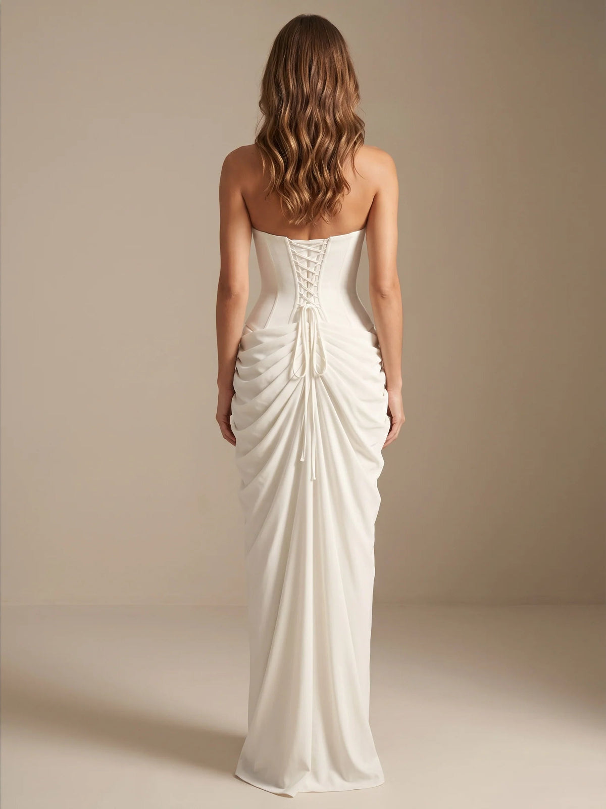 Ivory strapless mermaid maxi chiffon dress with ruched drape and gathered tie detail