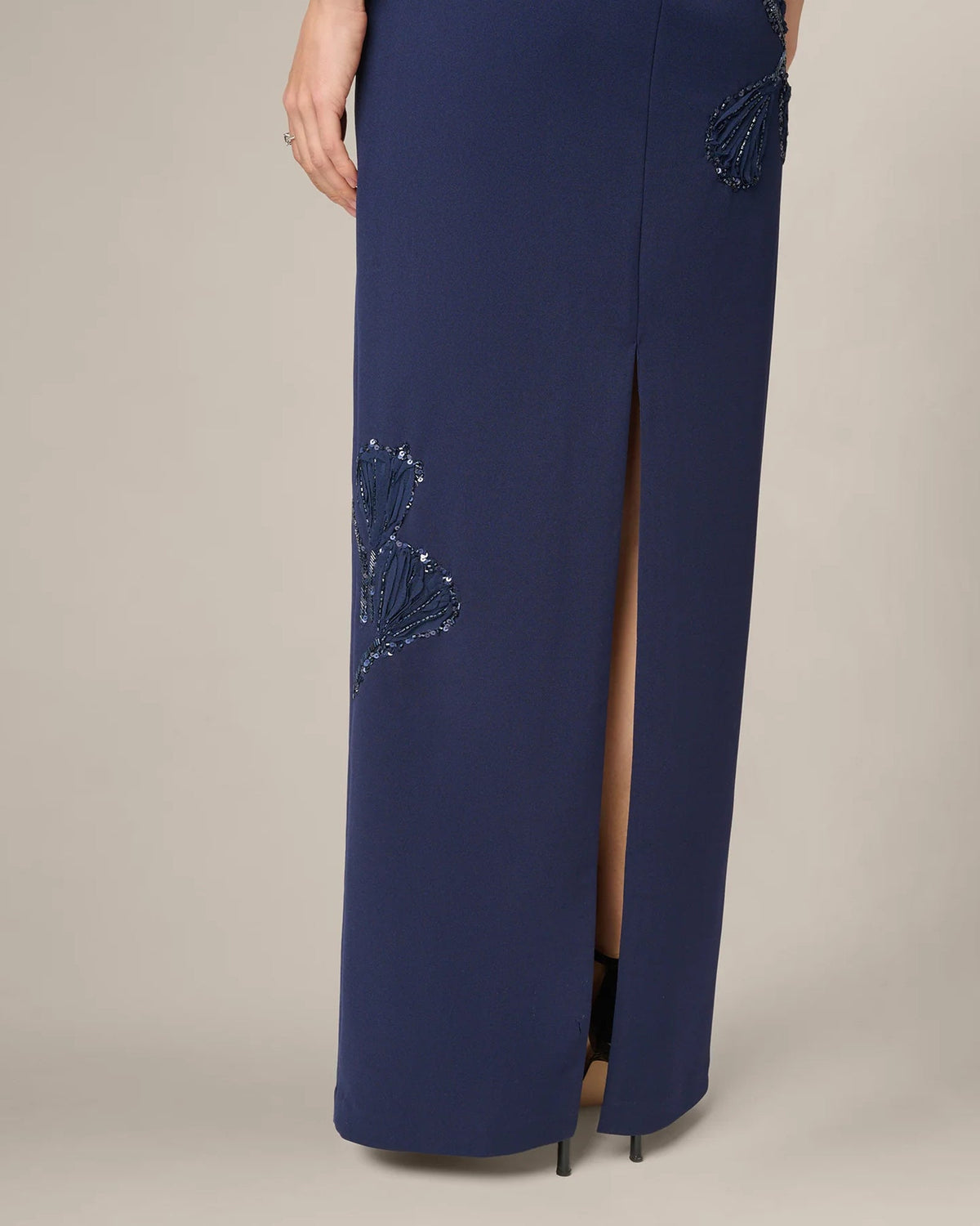 Dark navy strapless sheath maxi dress with floral beaded embroidery and front slit