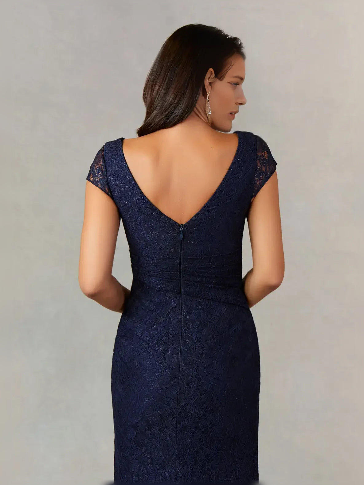 Dark navy mermaid dress with V-back, cap sleeves, and fitted skirt