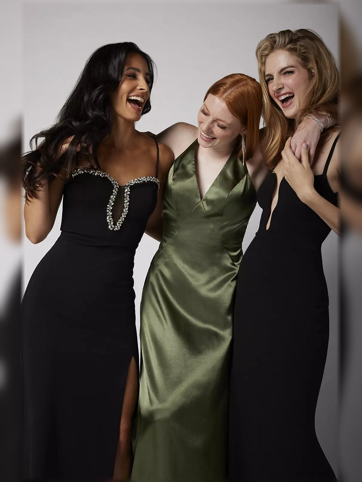 Black spaghetti-strap formal maxi dress with rhinestone trim and keyhole bust