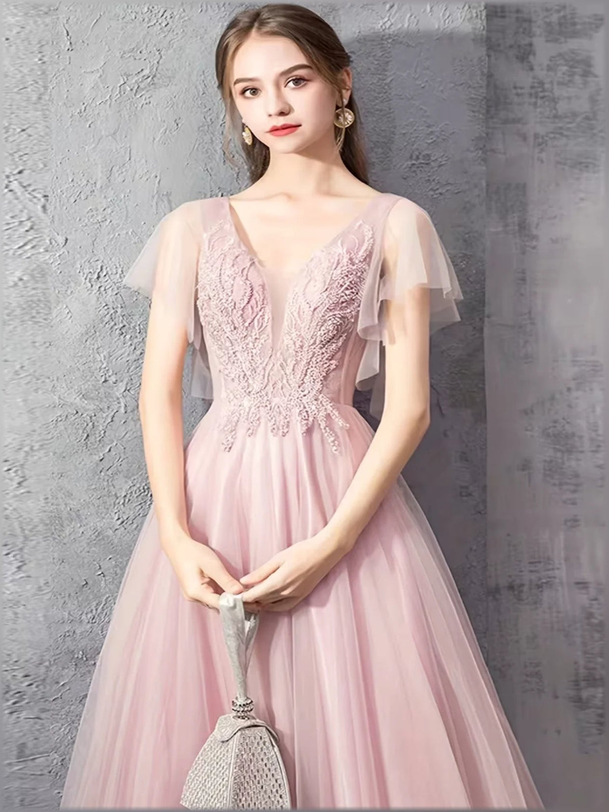 Blush pink off-shoulder formal dress with lace V-neck bodice and short sheer sleeve layers