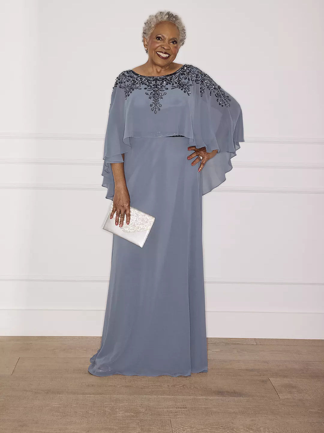 Periwinkle chiffon floor-length dress, beaded neckline, layered cape sleeves
