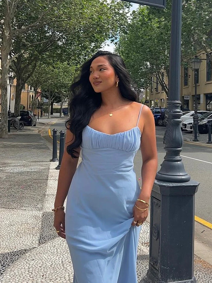 Light blue midi formal dress with square neckline and thin straps, fitted skirt