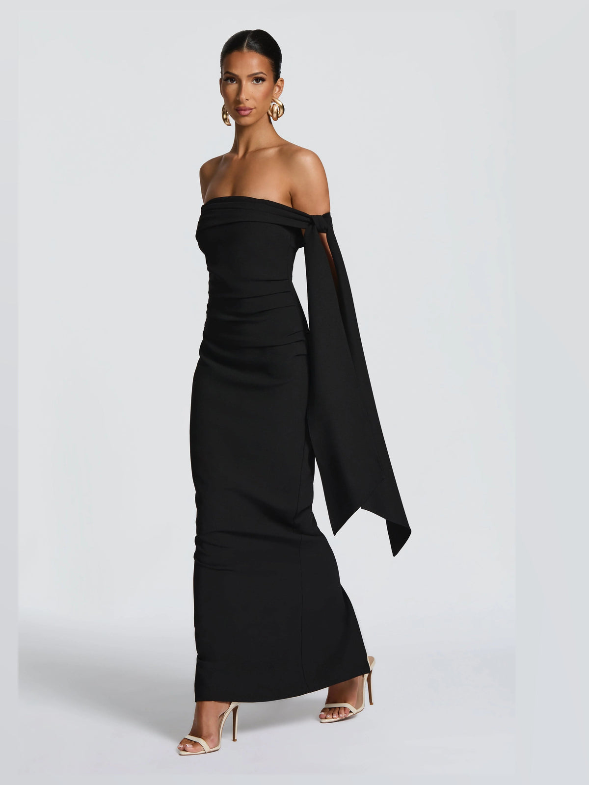Black maxi formal dress, alternate full-length view showing the skirt