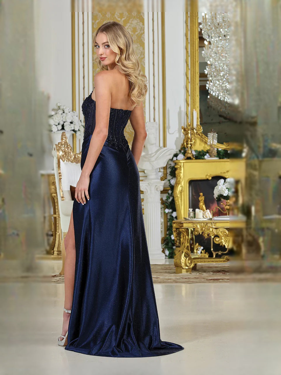 Dark navy strapless satin prom dress with beaded corset bodice and thigh-high slit