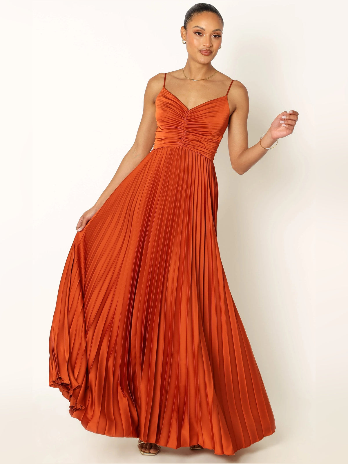 Orange V-neck spaghetti strap pleated maxi dress with gathered detail at bust