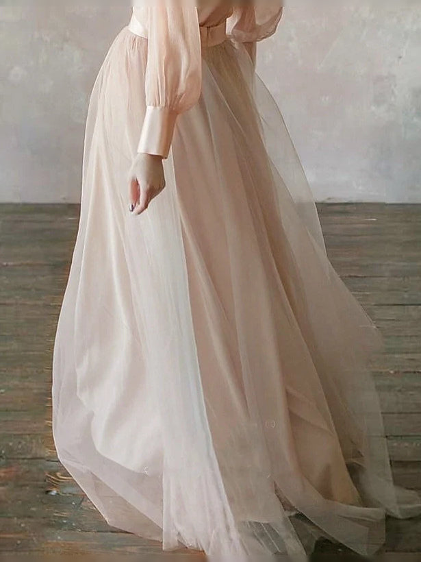 Champagne chiffon A-line maxi skirt with layered, airy ruffle hem