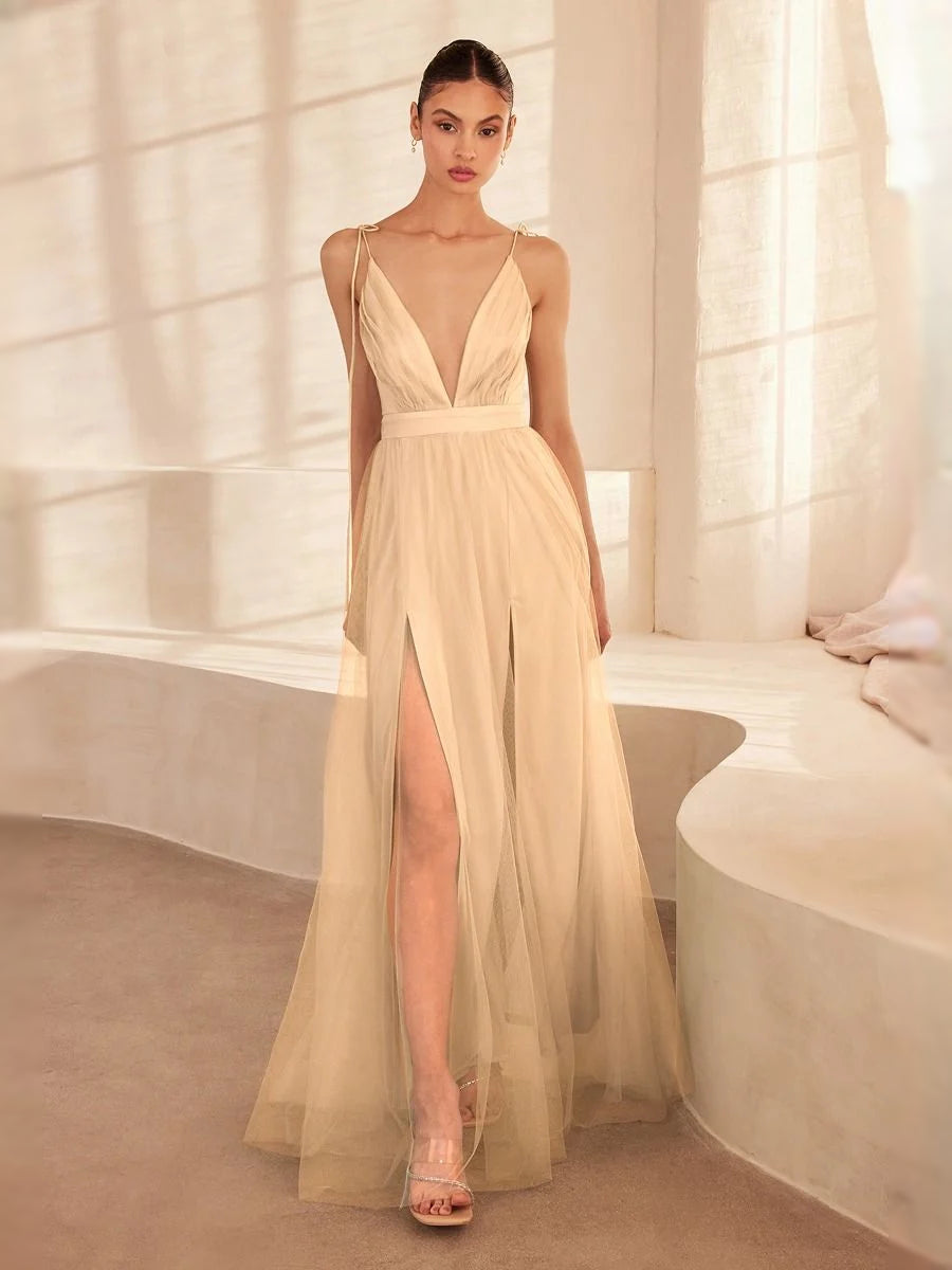 Champagne V-neck A-line maxi tulle prom dress with thin straps and side slit