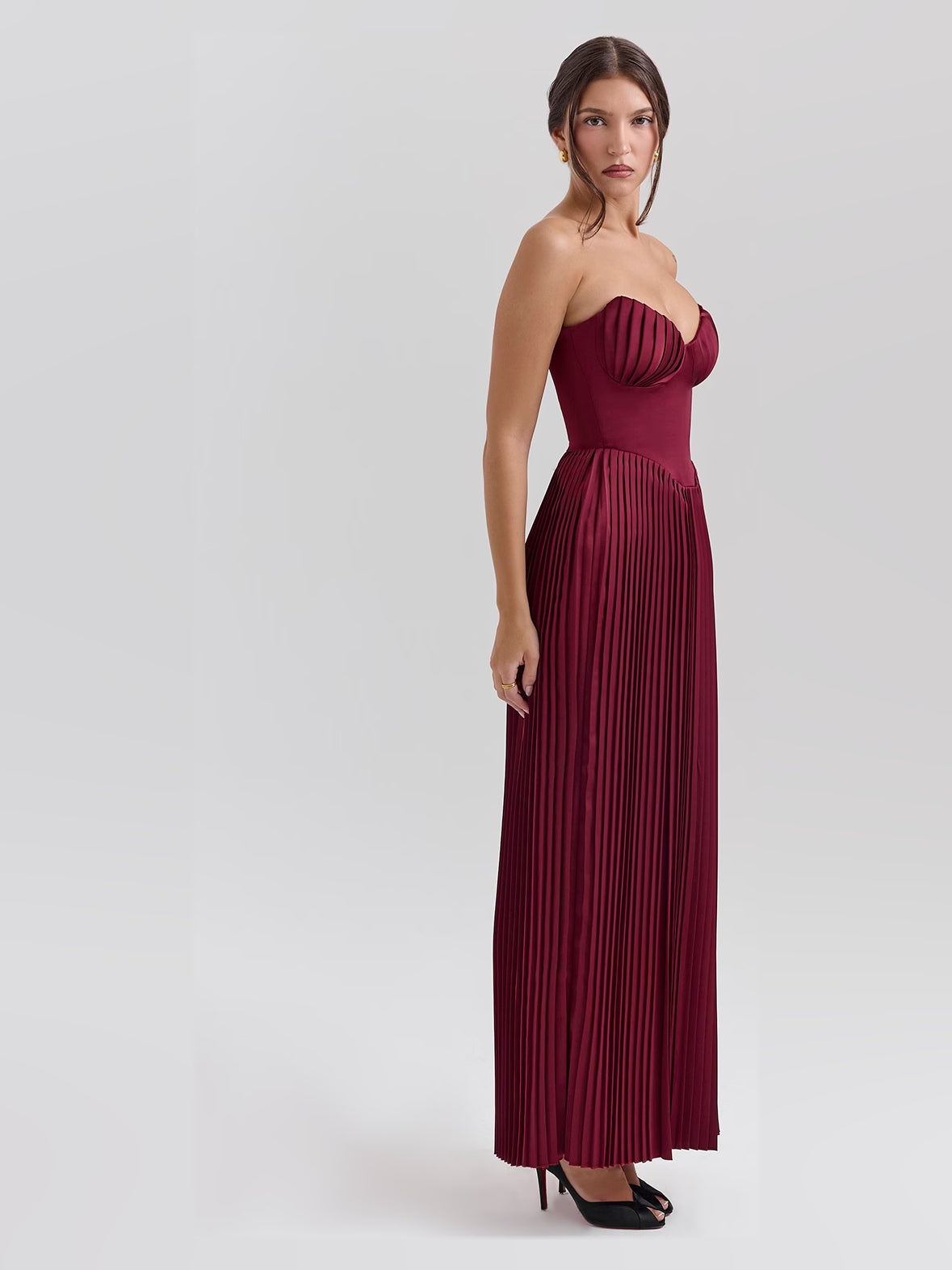 Burgundy a-line maxi formal dress with pleated skirt, alternate full-length view showing the waist