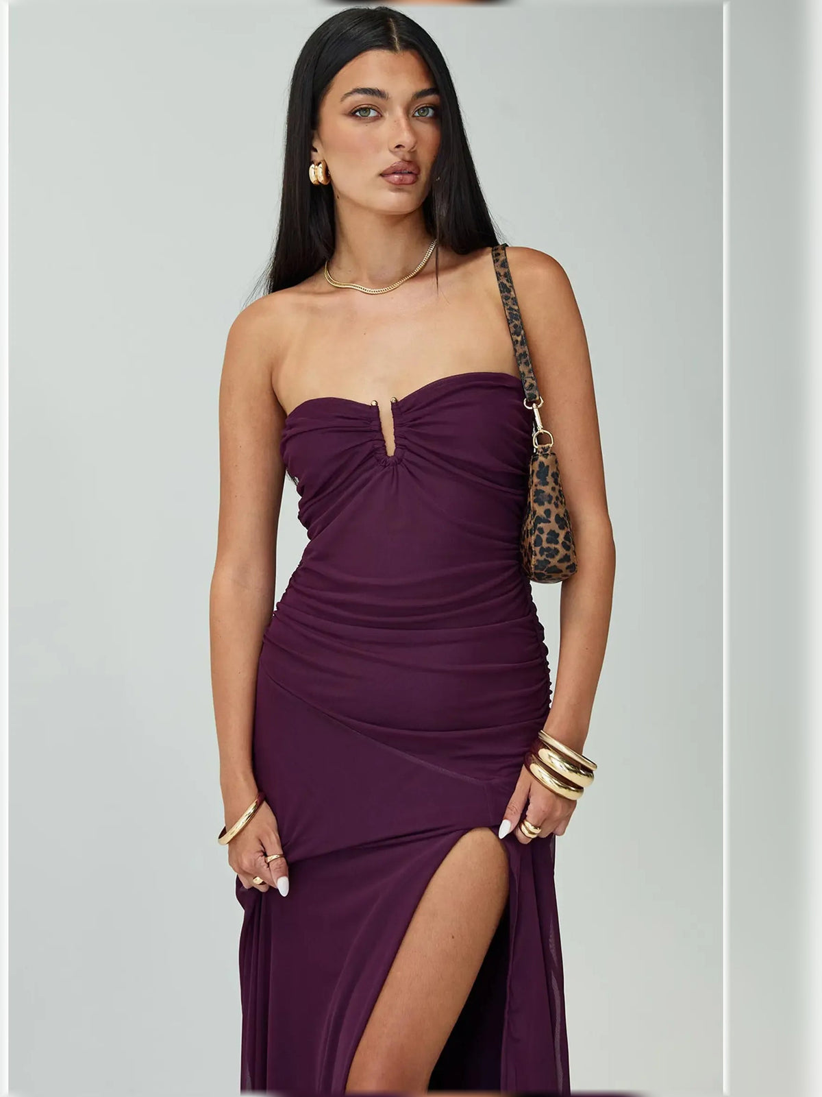 Purple strapless ruched slit maxi dress close-up, sweetheart neckline and ring keyhole