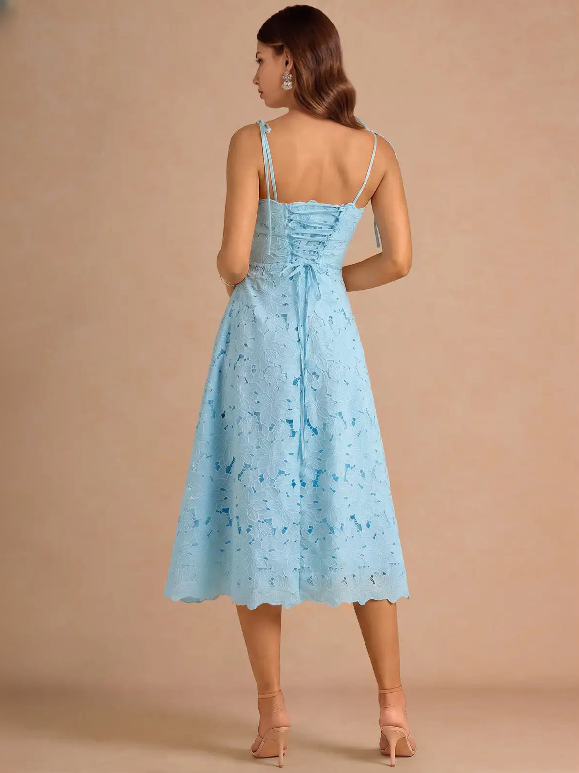 Light blue floral A-line midi dress with straight neckline and spaghetti straps