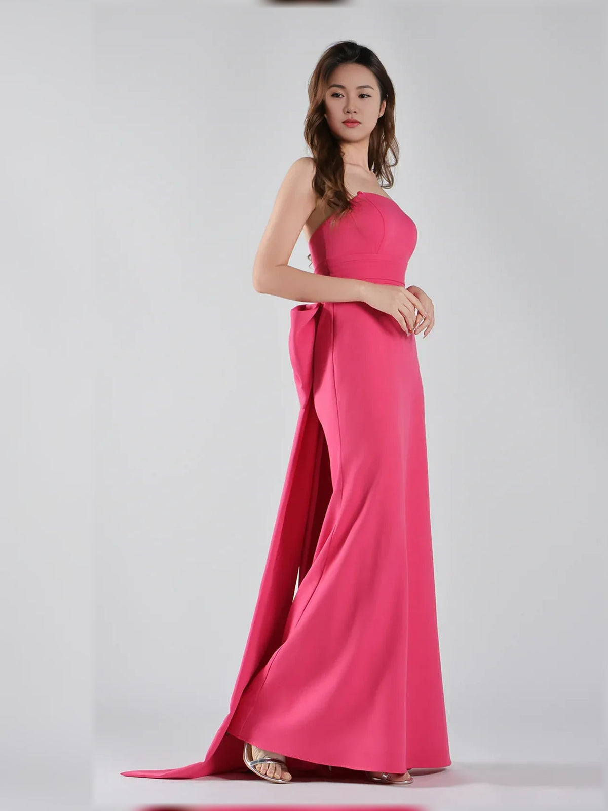 Hot pink strapless mermaid formal dress with side drape and high slit