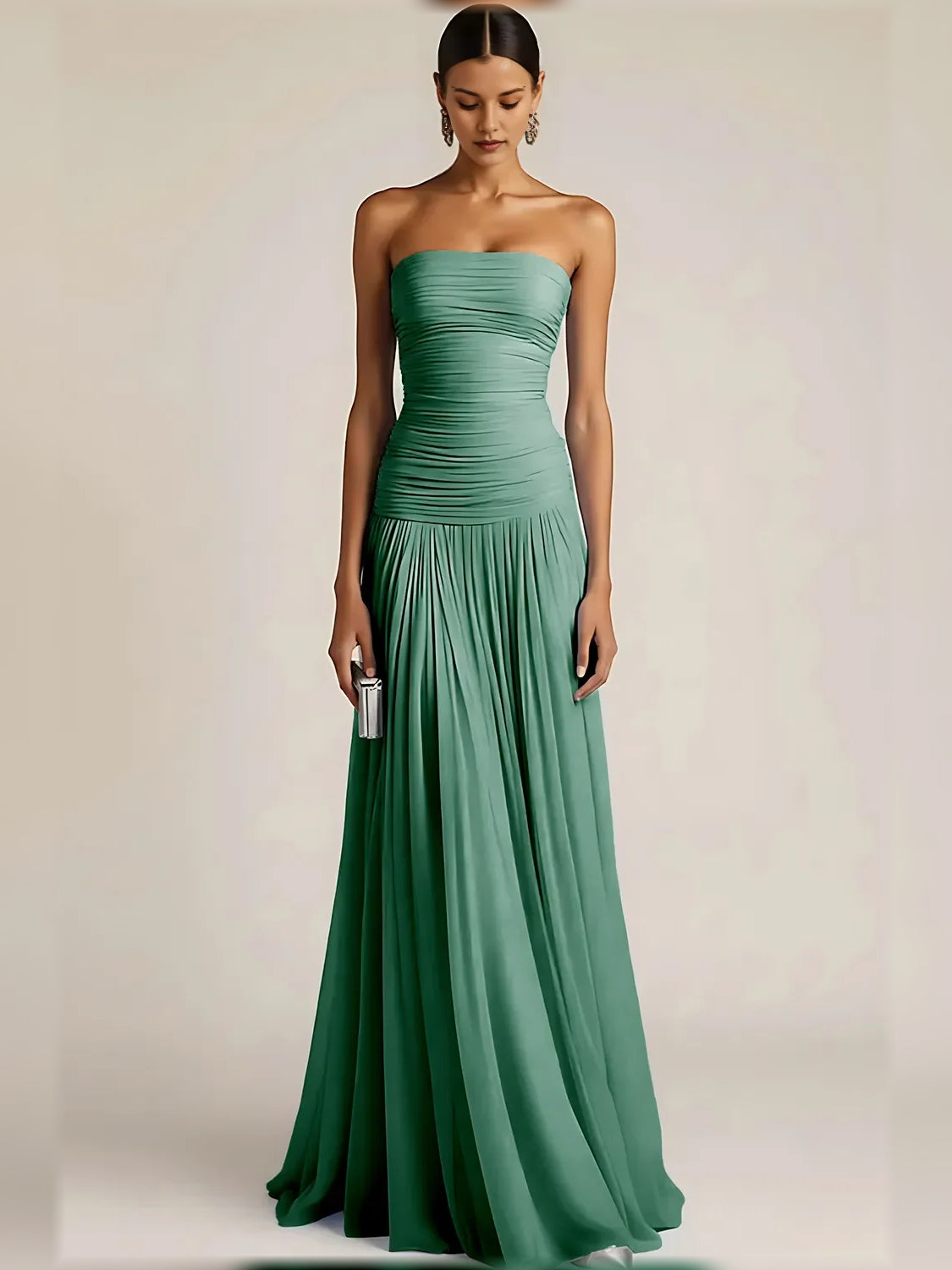 Emerald green strapless ruched pleated floor-length formal dress with gathered skirt