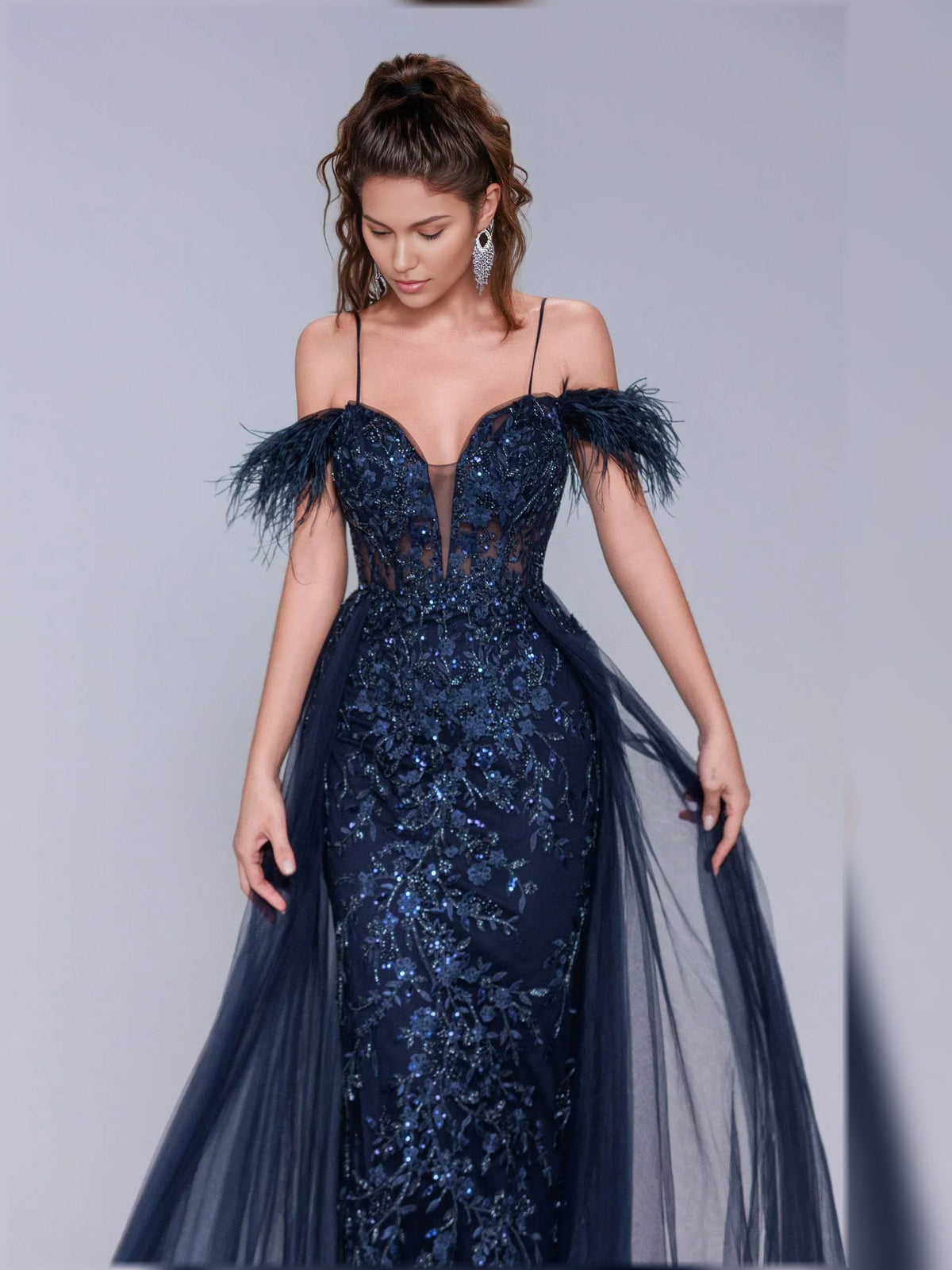 Navy off-shoulder corset formal dress with sparkling embellishment and feather-trim sleeves
