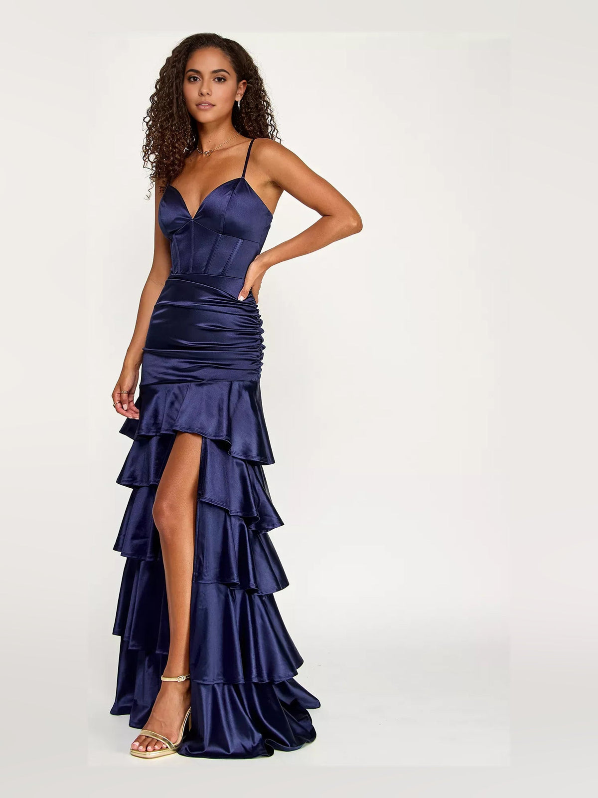 Navy satin corset dress with V-neck, gathered waist, and asymmetrical tiered ruffle skirt