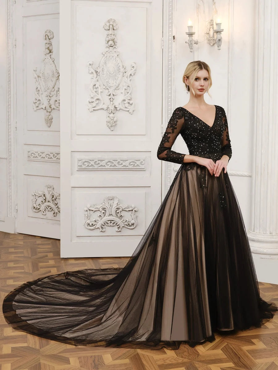 Black V-neck corset-style tulle wedding dress with long sleeves and flowing A-line hem