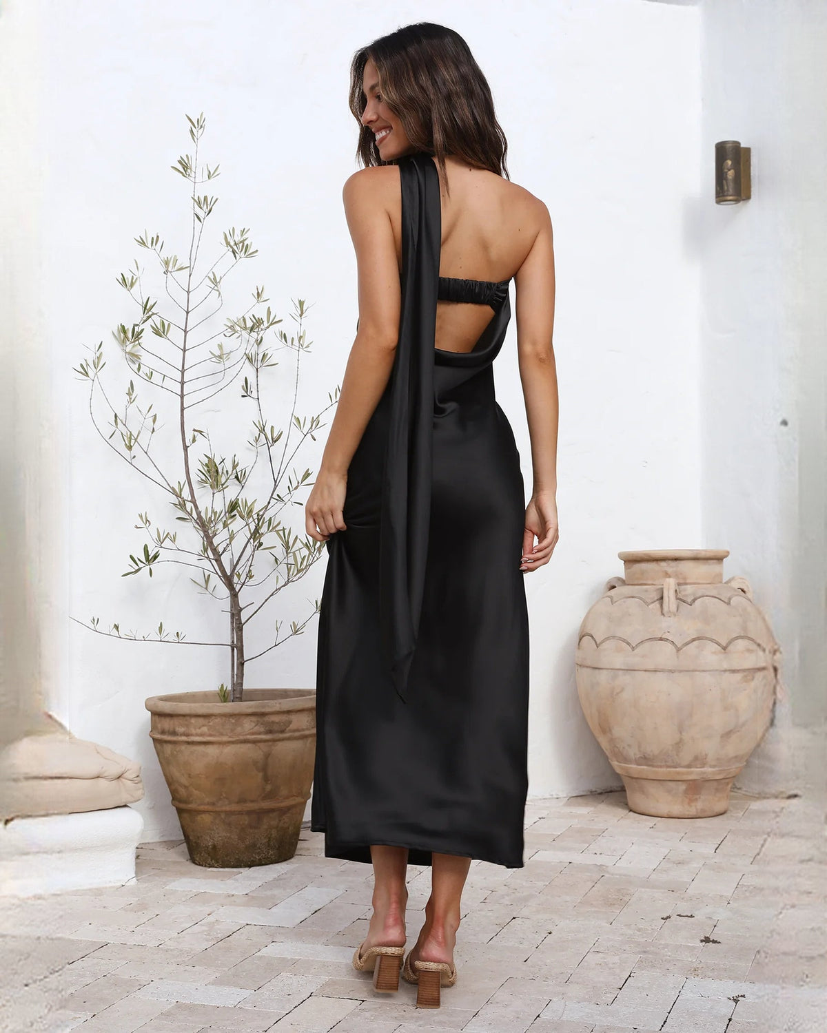 Satin A-line maxi bridesmaid dress, black open back with halter-style strap